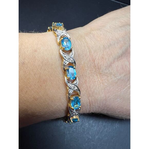 DJ Designers Jewelry - Vintage blue topaz and diamond gold over sterling silver tennis bracelet